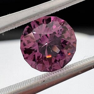 Rare pink, fuchsia color Garnet. Natural, Tanzanian origin gem. Precision cut round. 7.4mm image 6