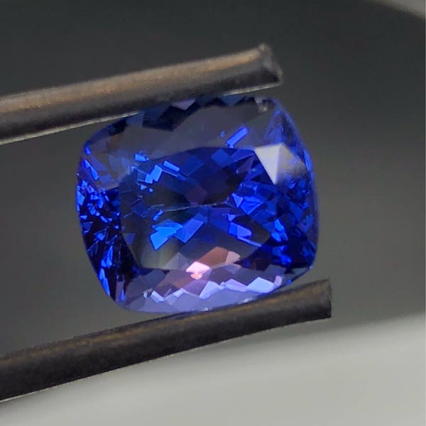 AAA Grade Natural Tanzanite in a cushion cut. 5.64ct Flawless gem.