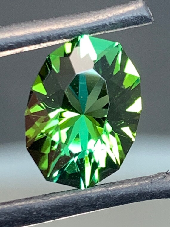 3.9ct Congolese Tourmaline. Precision cut, Gemmy stone. Dichroic, bright open color.