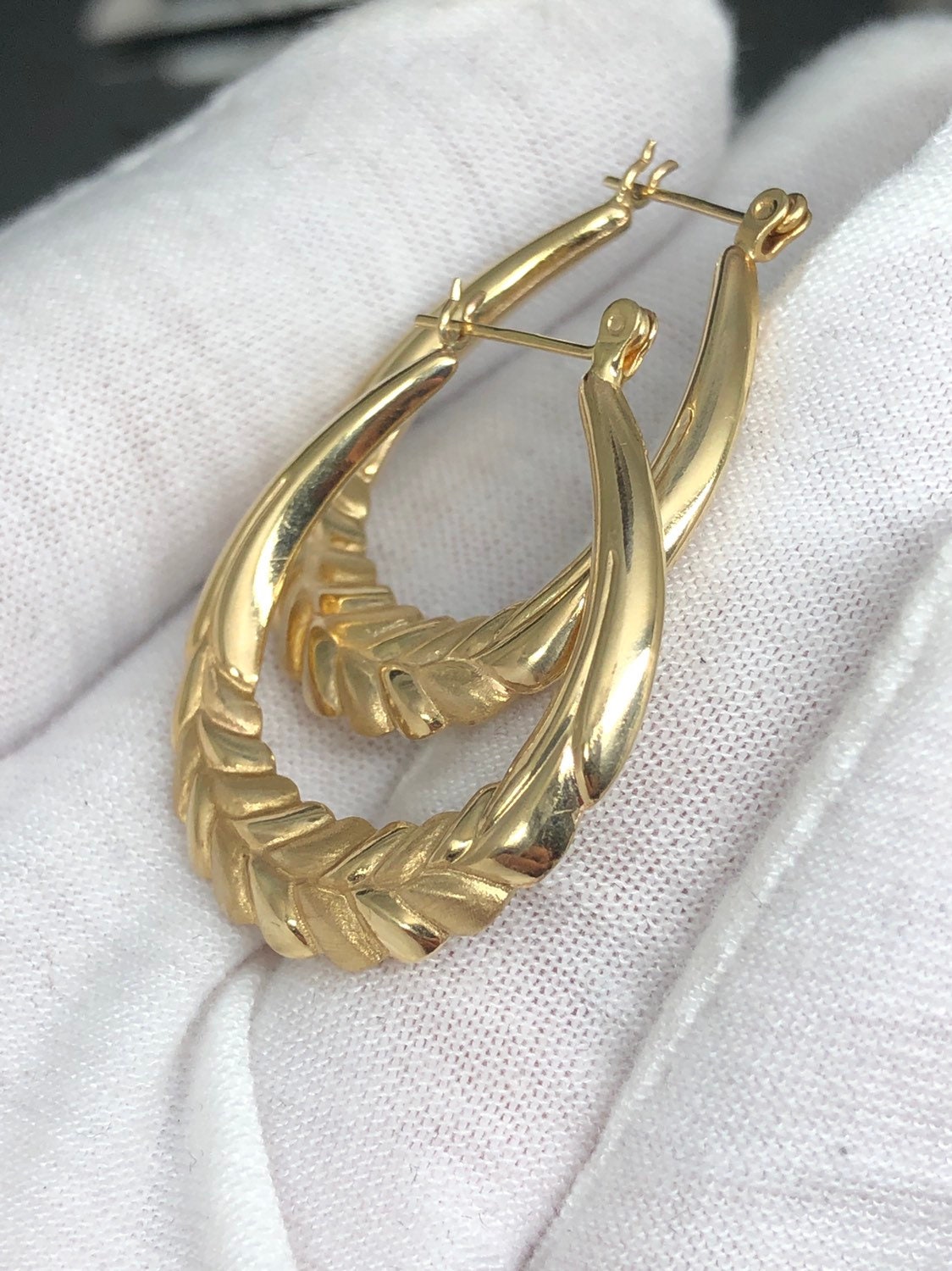 14k Laurel leaf hoop earrings. 28mmx26mm
