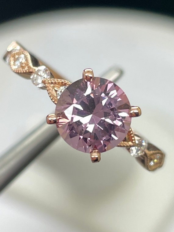 Pink Spinel ring. 14k Rose gold with natural diamond accents. 8mm round.