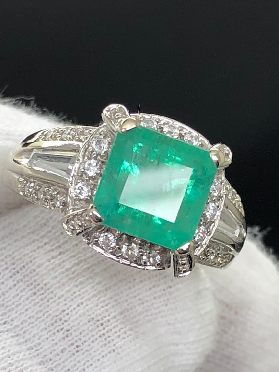 Natural 2.3ct emerald and diamond ring in 14k gold! Nice color, a real statement piece.