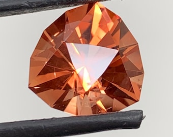 Oregon Sunstone trillion. 4.81ct natural, Precision cut gem. Light Schiller. Red, Orange. Nicely cut.