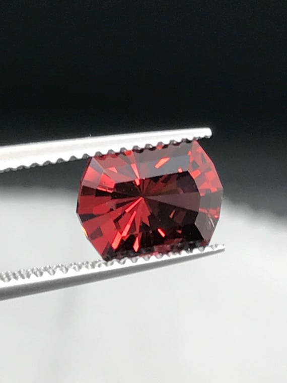 3.2ct Tanzanian Rhodolite Garnet. Sightly included. Masterfully cut and polished.