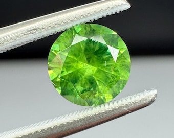 Russian Demantoid Garnet. Horsetail inclusions 1.21ct