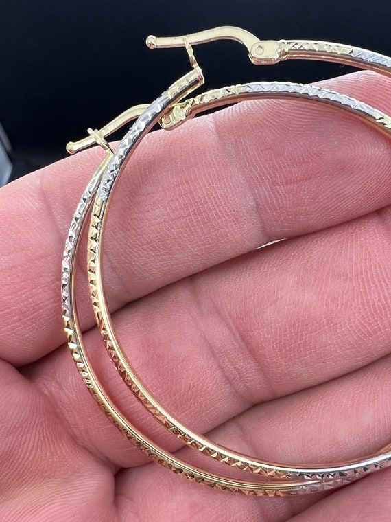 Multi color 14k gold large hoop earrings. 50mm white, yellow, and rose gold.