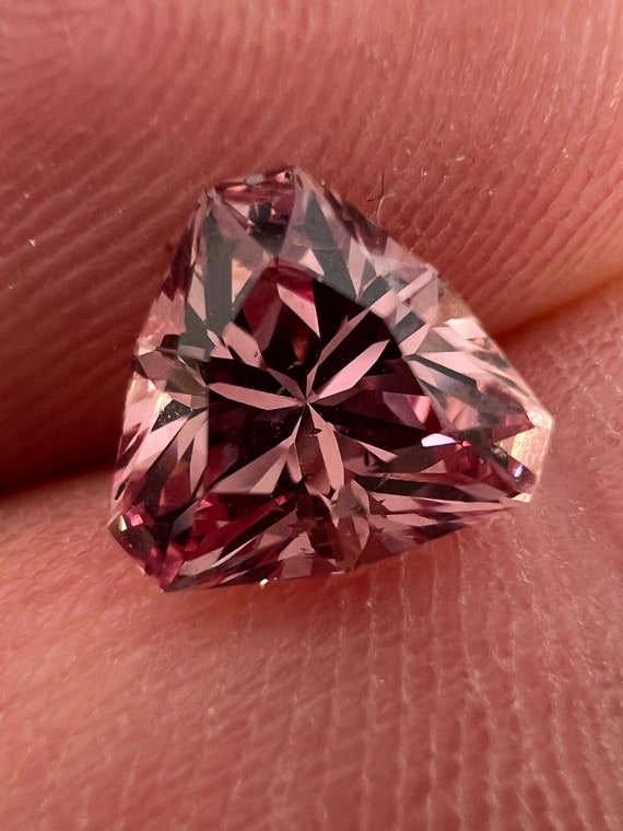 Pink Garnet. Mahenge origin. 1.64ct rare trillion shape gem.