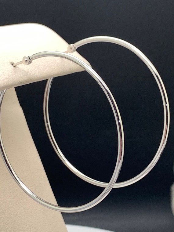Large 45mm white gold hoop earrings. Brand new fashion hoops.