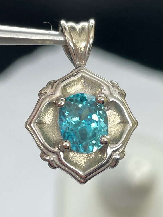 Cambodian Blue Zircon pendant in 14k white gold. 25x15mm