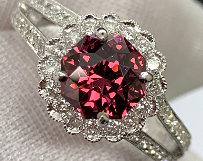 Featured listing image: Precision cut Umbalite Garnet in designer setting. 18k white gold with natural diamond accents.