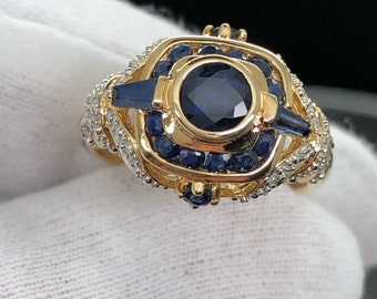 Beautiful natural Sapphire with diamond accents all in 14k.