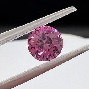 Rare pink, fuchsia color Garnet. Natural, Tanzanian origin gem. Precision cut round. 7.4mm image 5