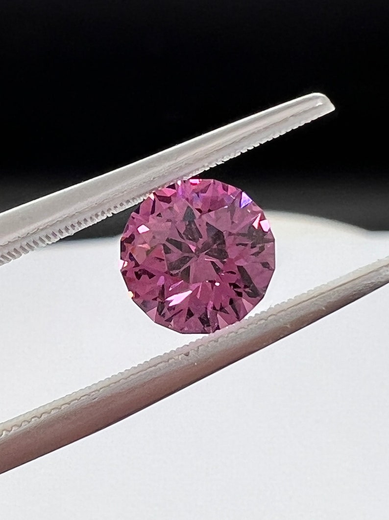 Rare pink, fuchsia color Garnet. Natural, Tanzanian origin gem. Precision cut round. 7.4mm image 5