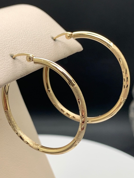 14k gold, etched and textured hoops in 30mm.