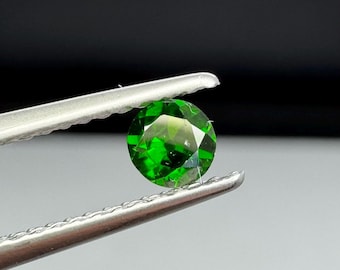 Russian demantoid garnet with horsetail inclusions, old European cut. 3.65mm