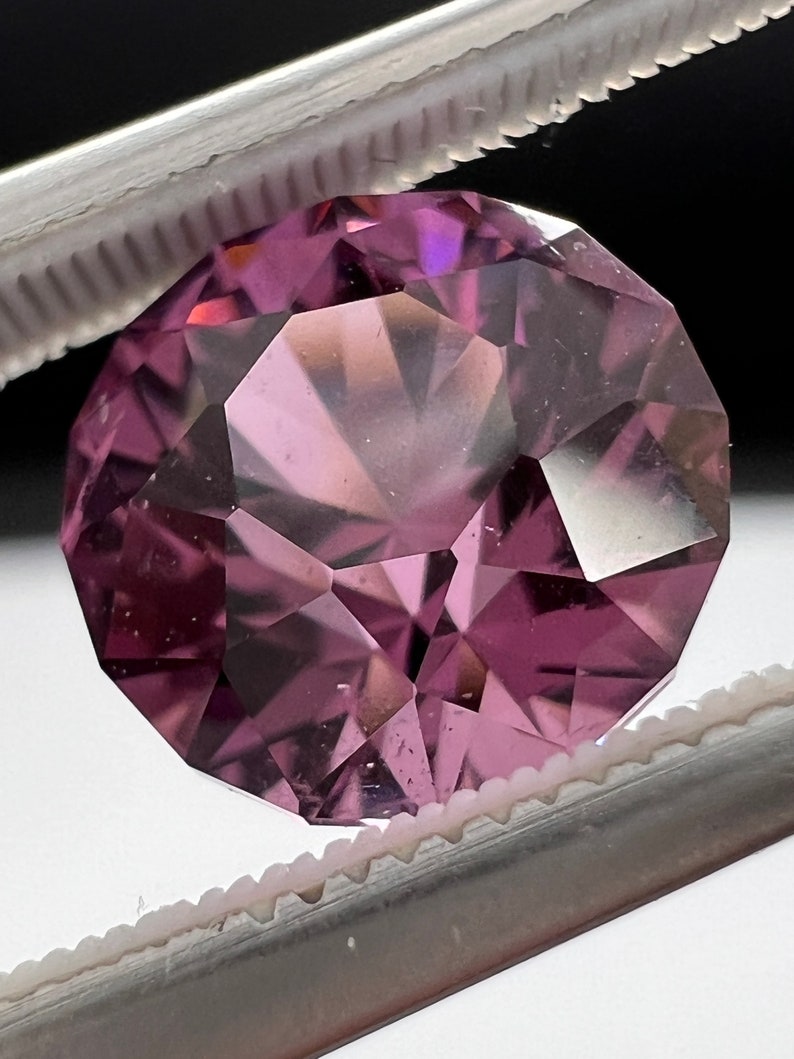 Rare pink, fuchsia color Garnet. Natural, Tanzanian origin gem. Precision cut round. 7.4mm image 7