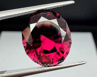 Oval cut Garnet. 10ct open color.