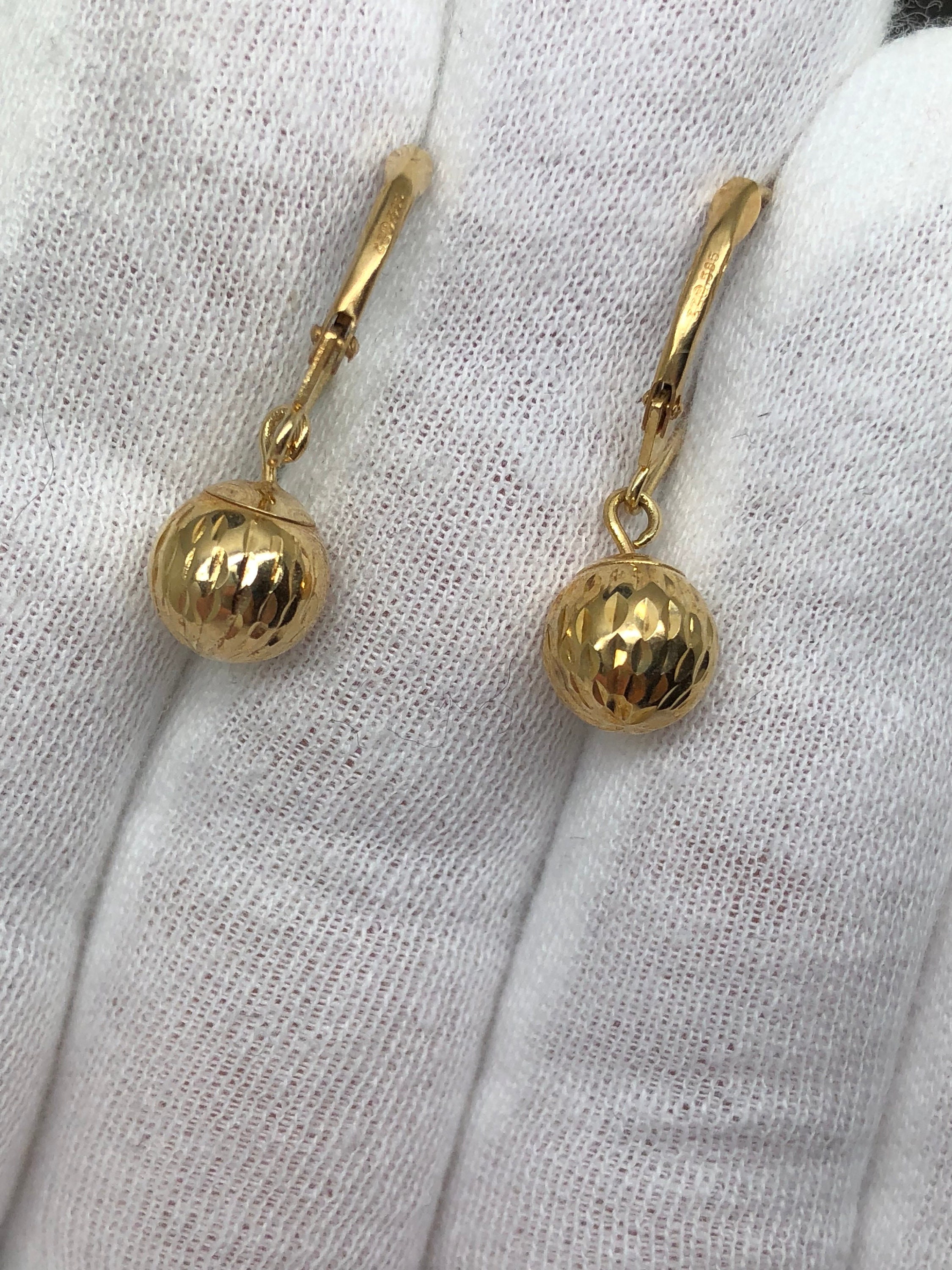 14k Gold balls. Dangle style earrings!