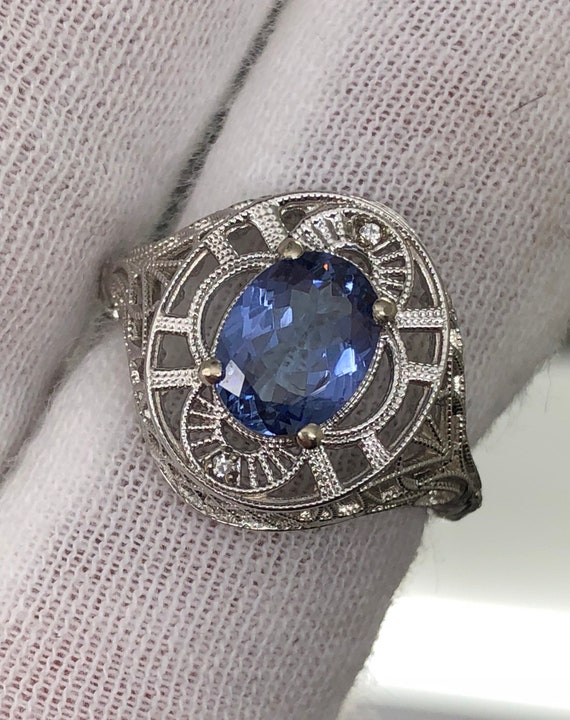 Two carat natural Tanzanite filigree ring in 14k gold.