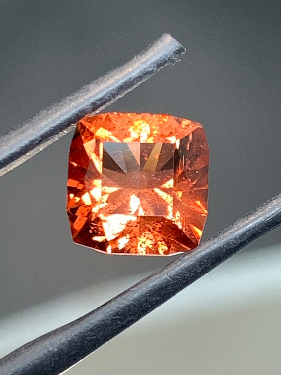 4.21ct Precision Cut, Red Sunstone. Gem grade rough with small Schiller.