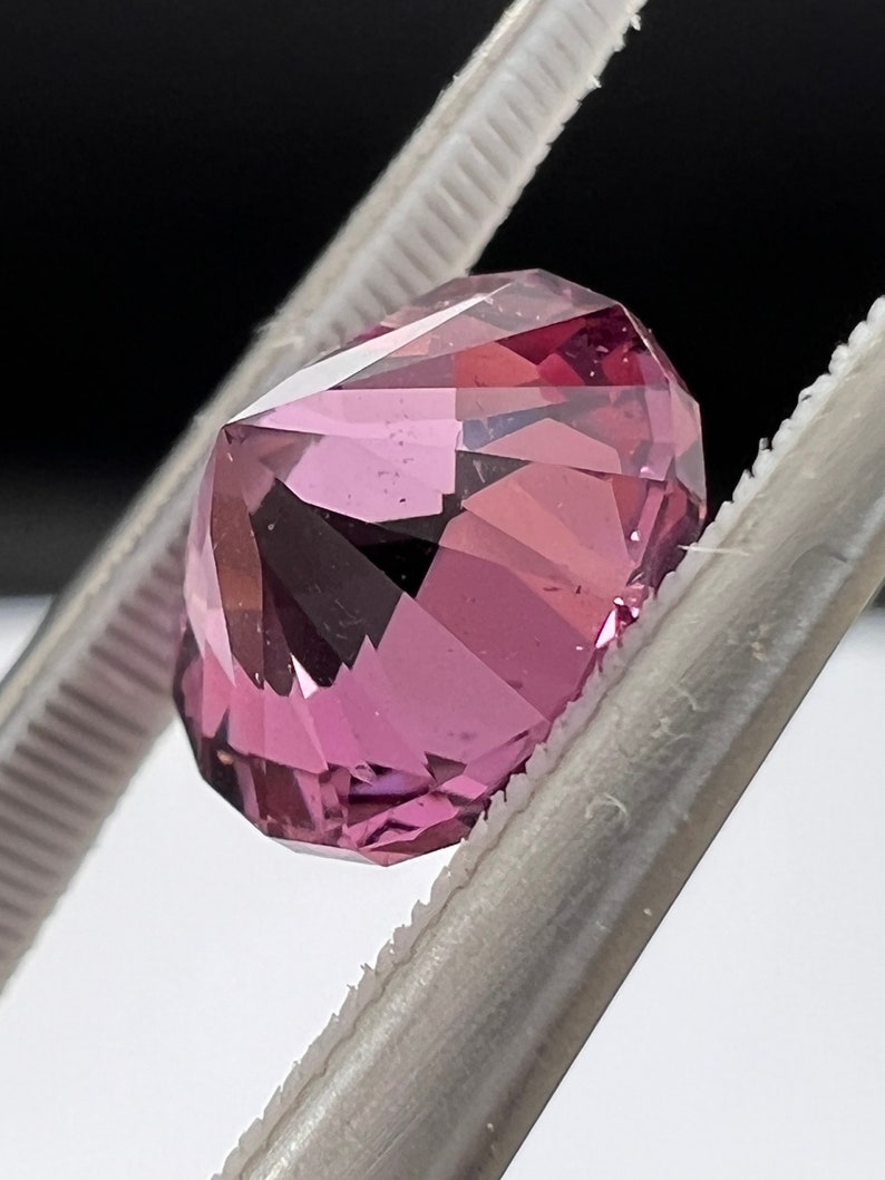 Rare pink, fuchsia color Garnet. Natural, Tanzanian origin gem. Precision cut round. 7.4mm image 4
