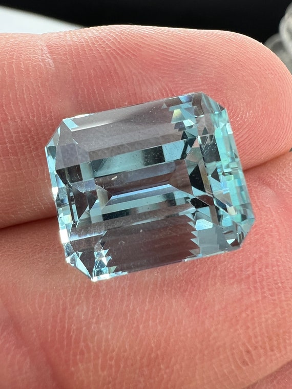 12.31ct Aquamarine, (GIA lab report included) natural beryl, 14.17x12.35x10mm clean, emerald cut.