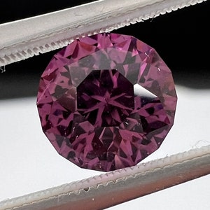 Rare pink, fuchsia color Garnet. Natural, Tanzanian origin gem. Precision cut round. 7.4mm image 8