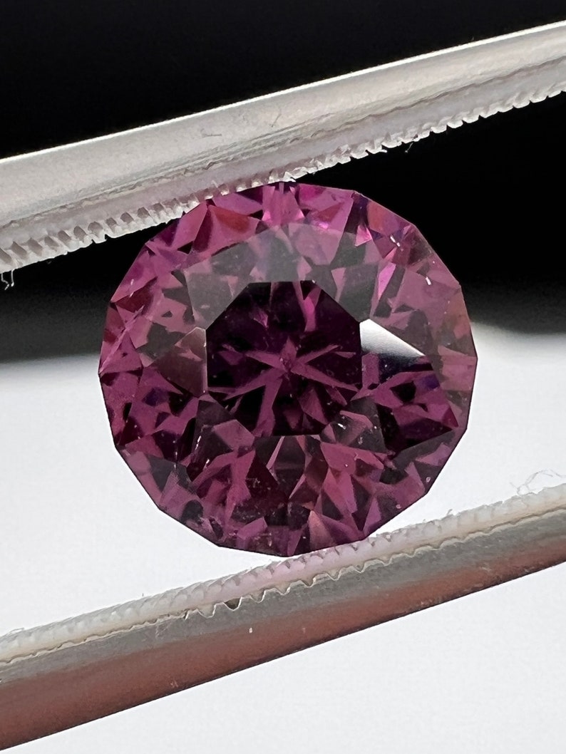 Rare pink, fuchsia color Garnet. Natural, Tanzanian origin gem. Precision cut round. 7.4mm image 8