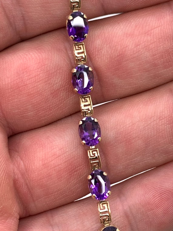 Designer amethyst and 14k gold bracelet. Unique Asian design link. 7 inch.