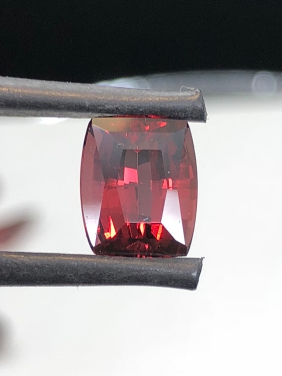 Cushion cut Umbalite Garnet. 2.43ct untreated clean.