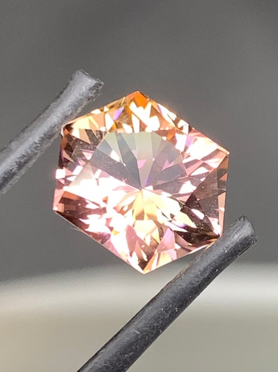 Tourmaline! 4.5ct Bi-color Pink and green, precision cut gemstone.