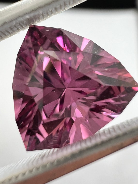 Rare Pink Mahenge Garnet. 2.66ct 8.9mm. Precision cut trillion.