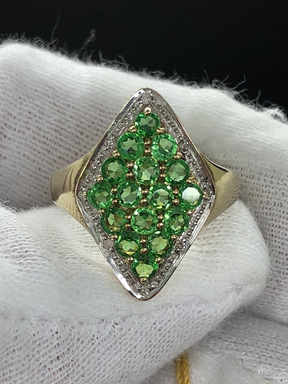 Natural green gemstones in stunning 10k gold design.