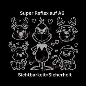 Könnte beinhalten: Ein reflektierender Aufkleberbogen im A6-Format mit einer zentralen Figur mit spitzem Kopf und Fell, umgeben von drei Rentierköpfen, einem Rentier mit Schal und kleinen Herzen. Der Text lautet Super Reflex auf A6 und Sichtbarkeit=Sicherheit.