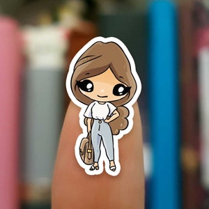 May include: A cartoon sticker of a girl with brown hair wearing a white shirt and blue jeans. She is holding a brown bag and smiling.