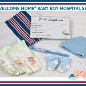 May include: A baby boy hospital set with a blue and red striped blanket, a blue hat, a pair of blue and white socks, a diaper, a blue wristband, and a birth certificate card. The card has the text "Birth Certificate" printed on it.