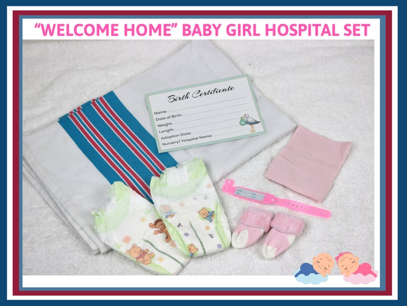 May include: A baby girl hospital set with a white blanket with blue and red stripes, a pink hat, a pair of pink booties, a diaper, a pair of socks, a pink bracelet with a blank tag, and a birth certificate card.