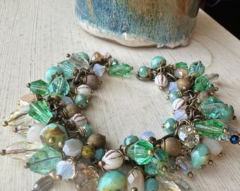 Cuidado personal - Pulsera calmante en racimo verde mar