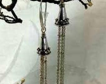 Ravishing 925 sterling silver long dangle earrings .