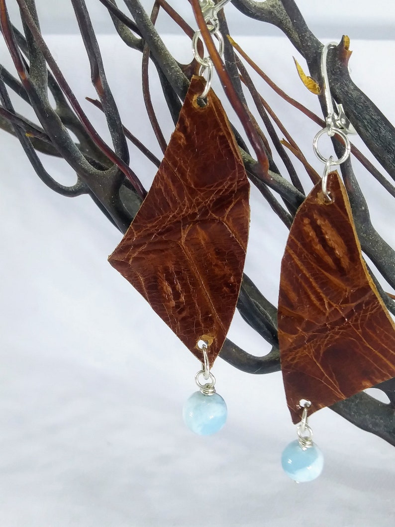 Beautiful leather earrings adorned with genuine Larimar gemstone