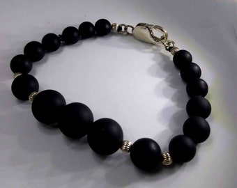 Gorgeous black pearls bracelet .