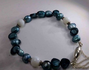 Ravishing Keshi pearls bracelet mounted with magnetic clasp and security chain .