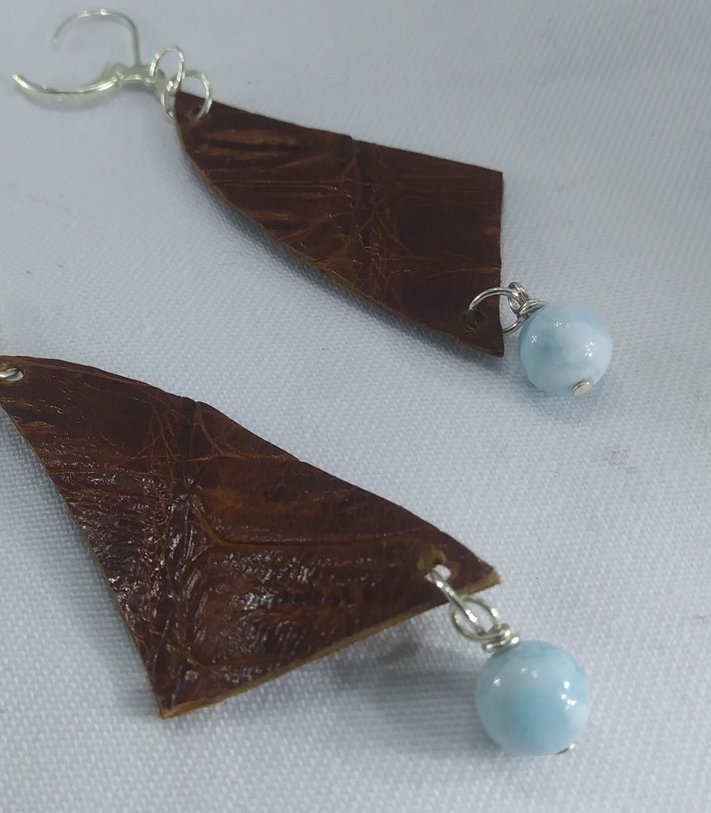 Beautiful leather earrings adorned with genuine Larimar gemstone