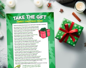 May include: A green and white printable Christmas game card with the title "Take the Gift: Grinchy Christmas Game". The card features instructions for a game where players take a gift if they fit the rhyme on the card. The card also features a cartoon image of a wrapped gift.