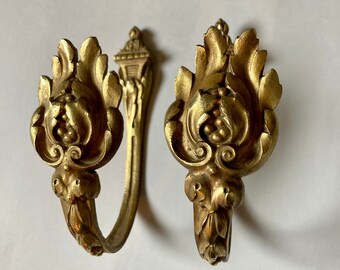 ANTIQUE TIE-BACKS - Pair of small 19th century French curtain tie-backs in bronze