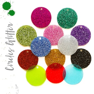 May include: Twelve round glitter circles in various colors, including red, green, blue, gold, silver, pink, purple, black, and turquoise.