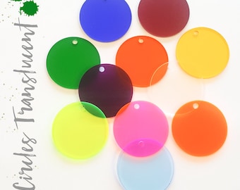 May include: Assortment of ten translucent, round, acrylic circles in various colors, including red, orange, yellow, green, blue, purple, pink, and light blue. Each circle has a small hole in the center.