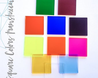 May include: Ten square pieces of colored translucent plastic in various colors, including green, red, orange, yellow, blue, purple, pink, and light blue.