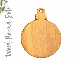 May include: A plain, unfinished wooden ornament shaped like a Christmas tree bauble. The ornament is ready to be painted or decorated.