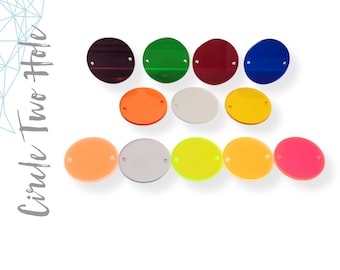 May include: Assortment of 12 colorful round acrylic blanks with two holes each. The colors include red, green, blue, orange, yellow, pink, white, and a few shades of orange.